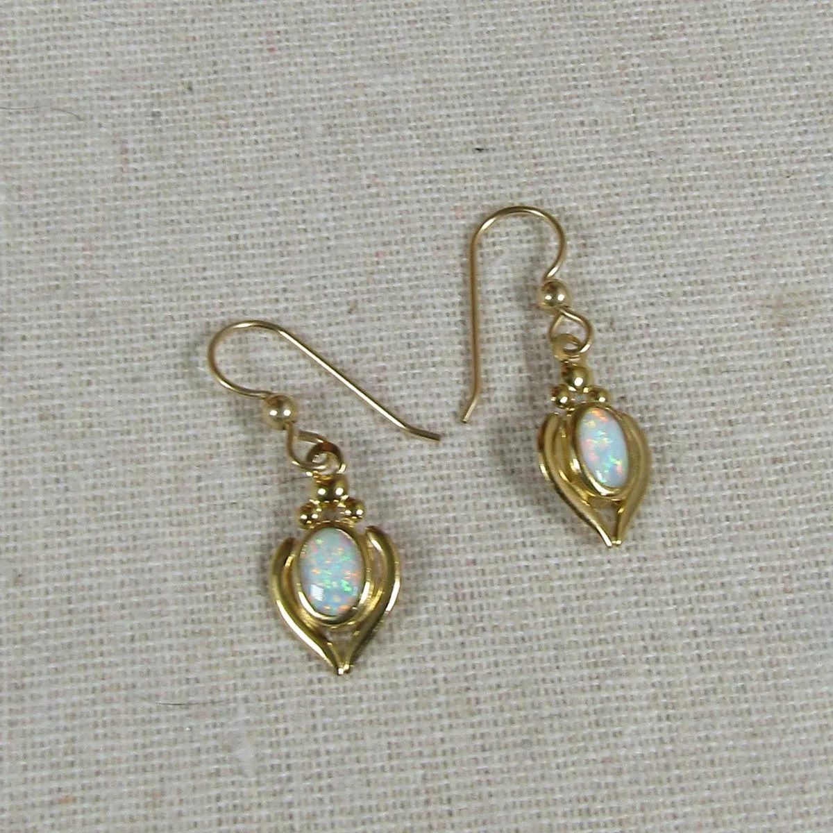 Elegant White Gibson Opal Gold Earrings